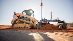 Sensors and processing power mounted on the Cat GB124 Smart Grader allow the attachment to interface with the loader and switch the loader joysticks to control the moldboard, with automation features like those found on full-sized graders.