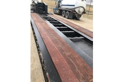 AFTER: Genuine Apitong/Keruing boards were cut then stained with the Apitong Oil and screwed down onto the lowboy using the installation tools supplied by TrailerDecking.com.