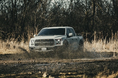 Some benefits offered by a lifted truck equipped with larger tires include increased visibility, along with needed ground clearance, both of which reduce risk of damage to the undercarriage.