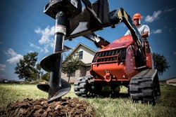 Stand-on skid steer attachments like augers help landscaping crews make efficient work even with a lean team.