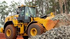 Digging and hauling larger rocks require a stronger bucket on wheel loaders like this Cat 966.