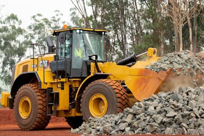 Digging and hauling larger rocks require a stronger bucket on wheel loaders like this Cat 966.