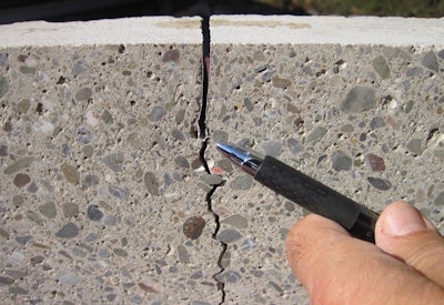 Insert joint using Trak Joint flexible plastic tape.