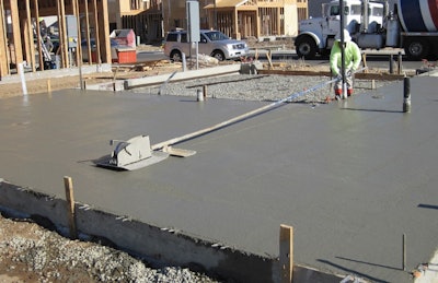 Traker for installing an insert joint in fresh concrete.