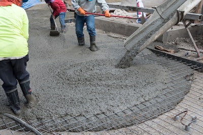 workers placing cement