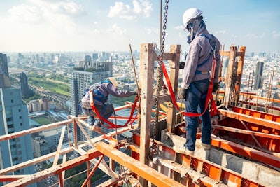 construction workers wearing safety gear
