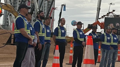 The nine Caterpillar Global Operator Challenge finalists began the day with a warm introduction by TV personality Mike Rowe.