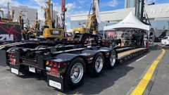 The custom trailer maintains a 70-ton rating at half the deck length and offers 6-in. loaded road clearance.