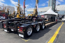 The custom trailer maintains a 70-ton rating at half the deck length and offers 6-in. loaded road clearance.