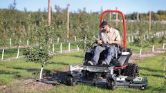 The extension provides 16 in. of additional cutting width (82 in. total) and flexes up to 12 degrees to follow the terrain.