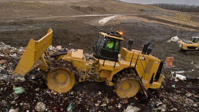 The system includes a global navigation satellite system (GNSS) receiver on top of the 836 and mapping display inside the cab.
