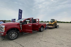 This demo showed that the truck alerts the driver that the equipment needs to come forward on the trailer for safe towing.
