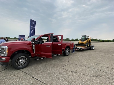 This demo showed that the truck alerts the driver that the equipment needs to come forward on the trailer for safe towing.