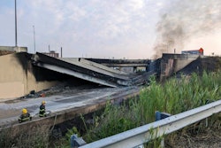 This image provided by the Office of Emergency Management shows firefighters standing near the collapsed part of I-95 in Philadelphia, Sunday, June 11, 2023.