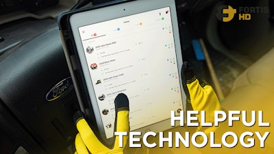 Operator Using An Ipad To Help Identify Machines For Maintenance