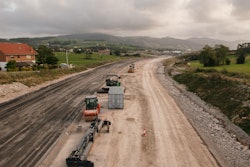 Road base is typically introduced after the subgrade has been prepared and compacted to a stable and level surface.