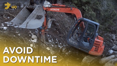 A Broken Down Hitachi 75 Mini Excavator