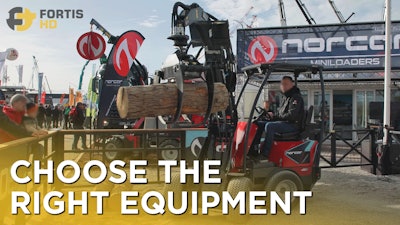 Heavy Equipment With A Log Grab Attachement