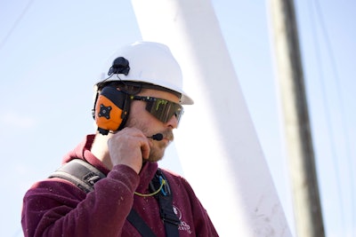 This helmet mount features tactile buttons for navigation and optional dual battery usage.