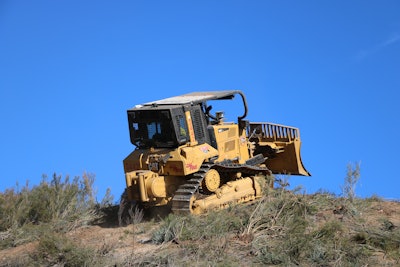 The water tank is compatible with the winch attached and is tucked in the back of the machine so operators can still use the rear attachment as normal.