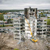 High-reach excavators are often used on deconstruction sites of large industrial plants and city buildings.