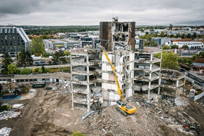 High-reach excavators are often used on deconstruction sites of large industrial plants and city buildings.