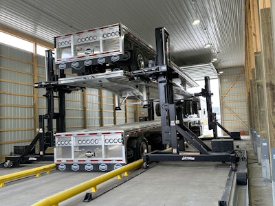 The stacking system requires just one person to operate without the need for special rigging, slings or climbing onto the trailers.
