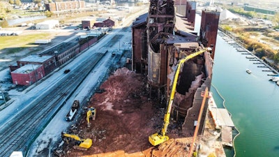 Demolition debris often contains bulky, heavy materials, including concrete, wood from buildings, asphalt from roads and roofing shingles, gypsum (the main component of drywall), metals, bricks, glass, and plastics.