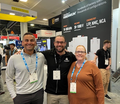 Editor-in-Chief Lori Ditoro and Account Executive Greg Schulz talk with Xerotech's Jesse Morris about the company's battery packs.