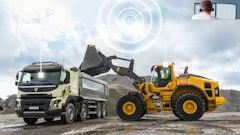 The dump truck and wheel loader are connected through Connected Load Out.