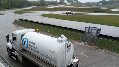 Driving the Mack MD Series trucks at Road America, Elkhart Lake, Wisconsin. Our course was set out with a lot sharper turns than this image is able to depict.