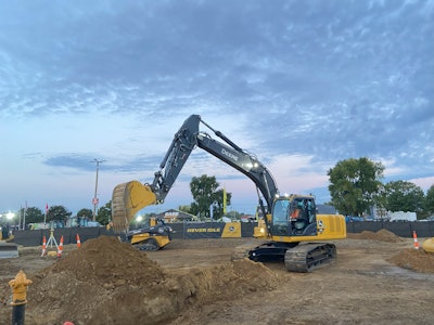 John Deere demos the excavator's grade control.