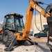 Backhoes can be used to do everything from laying pipe to digging trenches and can even break up concrete or asphalt with a hydraulic hammer attachment.