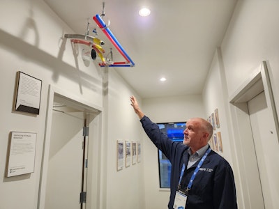 Factory OS Vice President of Design Engineering Andrew Meagher in a residential module with enclosed, inspected panels ready for mechanical installation in the field.