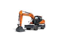 The DX140W-7 can be configured with a front dozer blade and independent rear outriggers or four independent outriggers.