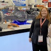 Editor-in-Chief Lori Ditoro talks with the Allison Transmission team during Work Truck Week 2023.