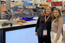 Editor-in-Chief Lori Ditoro talks with the Allison Transmission team during Work Truck Week 2023.