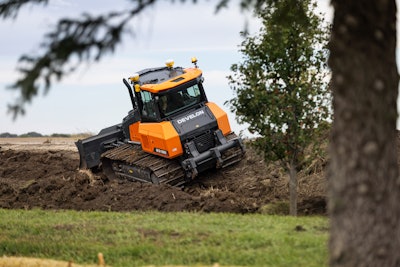 The grade control system does not require masts, improving the operator’s visibility of the dozer blade and the work area. The system operates from two globes that are mounted on top of the dozer cab.
