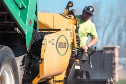 Zach Buck running the paver for Buck Brothers