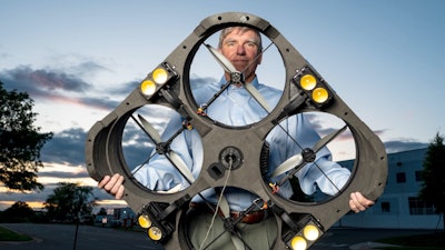 The compact area lighting system mounts a high-intensity LED array on a tethered unmanned aerial vehicle, also known as a drone, positioning the light 40 feet up to 100 feet above a jobsite.