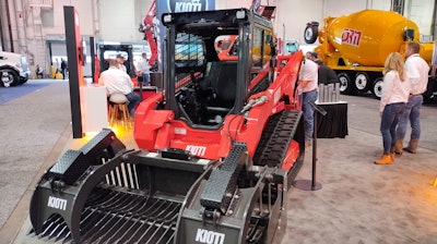 Known for quality tractors, KIOTI officially released their compact construction machine line to dealers in August 2023 (their CTL pictured, a skid steer sat behind me). These were designed to be as straight-forward as possible without a lot of the high-tech solutions from other machines. Impressively, a ton of the machinery can be accessed by an easy-to-open swing door at the back for maintenance and repair.