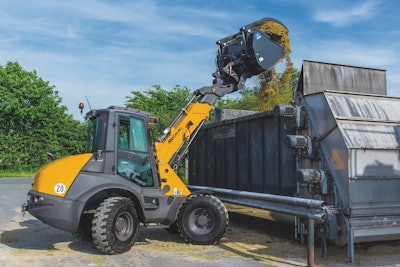 Equipped with loading forks, the machine has a lifting height of up to 15 ft., 2 in. (4.66 m) and reach of up to 9 ft., 9 in. (3 m).