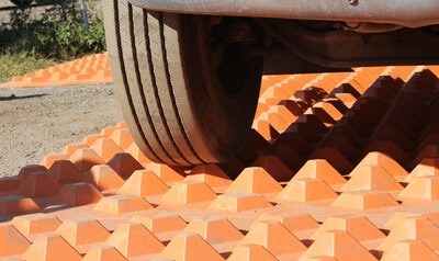 DiamondTrack trackout mats feature a diamond-shaped terrain that delivers strength and durability in sediment dislodgement from vehicle tires as they exit construction zones.