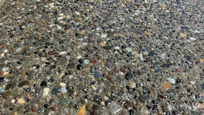 Coca-Cola and Exposed Pea Gravel Concrete Finish