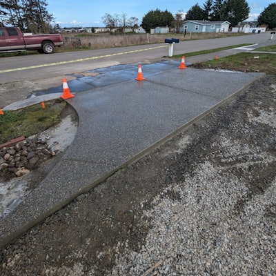 Coca-Cola and Exposed Pea Gravel Concrete Finish