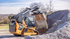 The Hyundai HT100V CTL working in a gravel-hauling application.