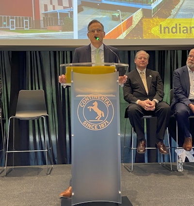 Etzel gives opening remarks during the open house.