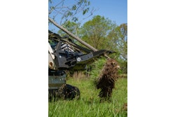 The attachment features dual 3.5- x 4-in. bore cylinders with a clamping force of 29,000 lbs., allowing removal of shrubs and trees along with their roots to prevent regrowth.