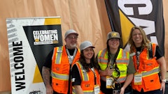 Burds accepts the overall winner trophy.