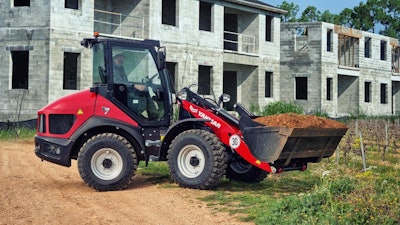 As part of the company's shift in market approach, execs explain the strategy behind the brand's 2020 departure from conventional yellow machine livery to today's Premium Red.